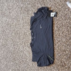 Nike Dri-Fit shirt, charcoal gray, it's a size 1x.